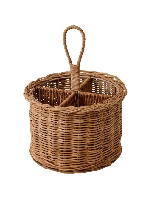 Open-weave rattan utensil holder included in the table decor edit.