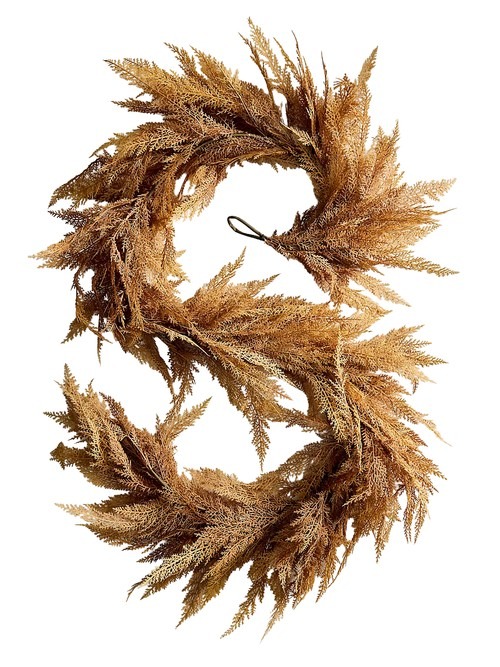 Faux autumn cedar garland included in the fall mantel selection.
