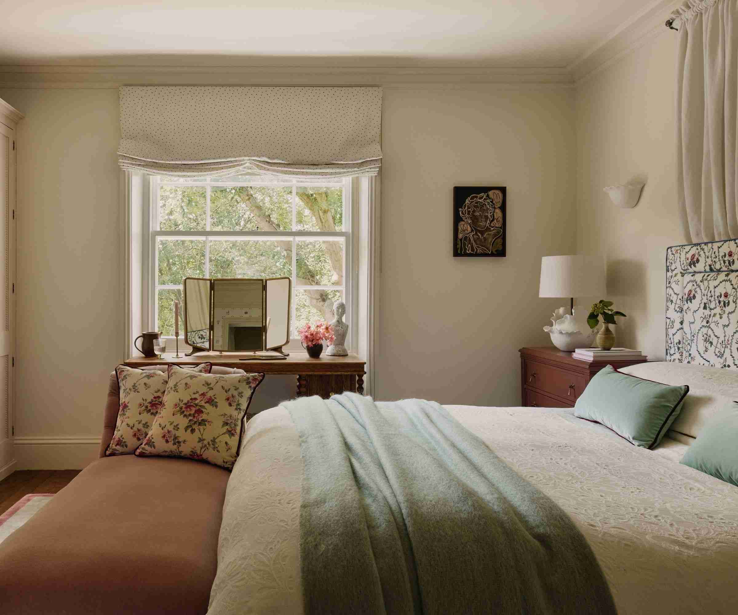 a neutral cozy bedroom in london by Emma Ainscough