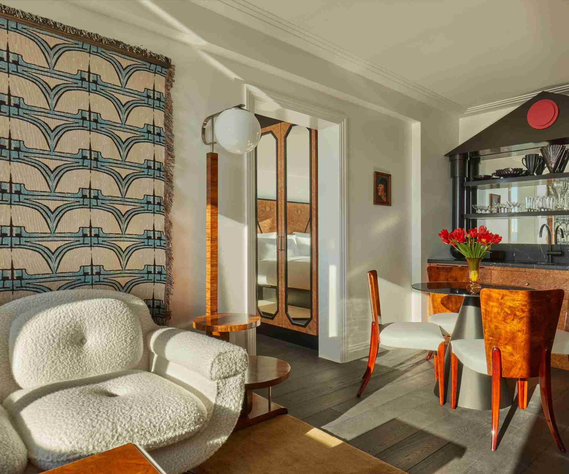 Lore Group lounge area with textured upholstery and contrasting furnishings.