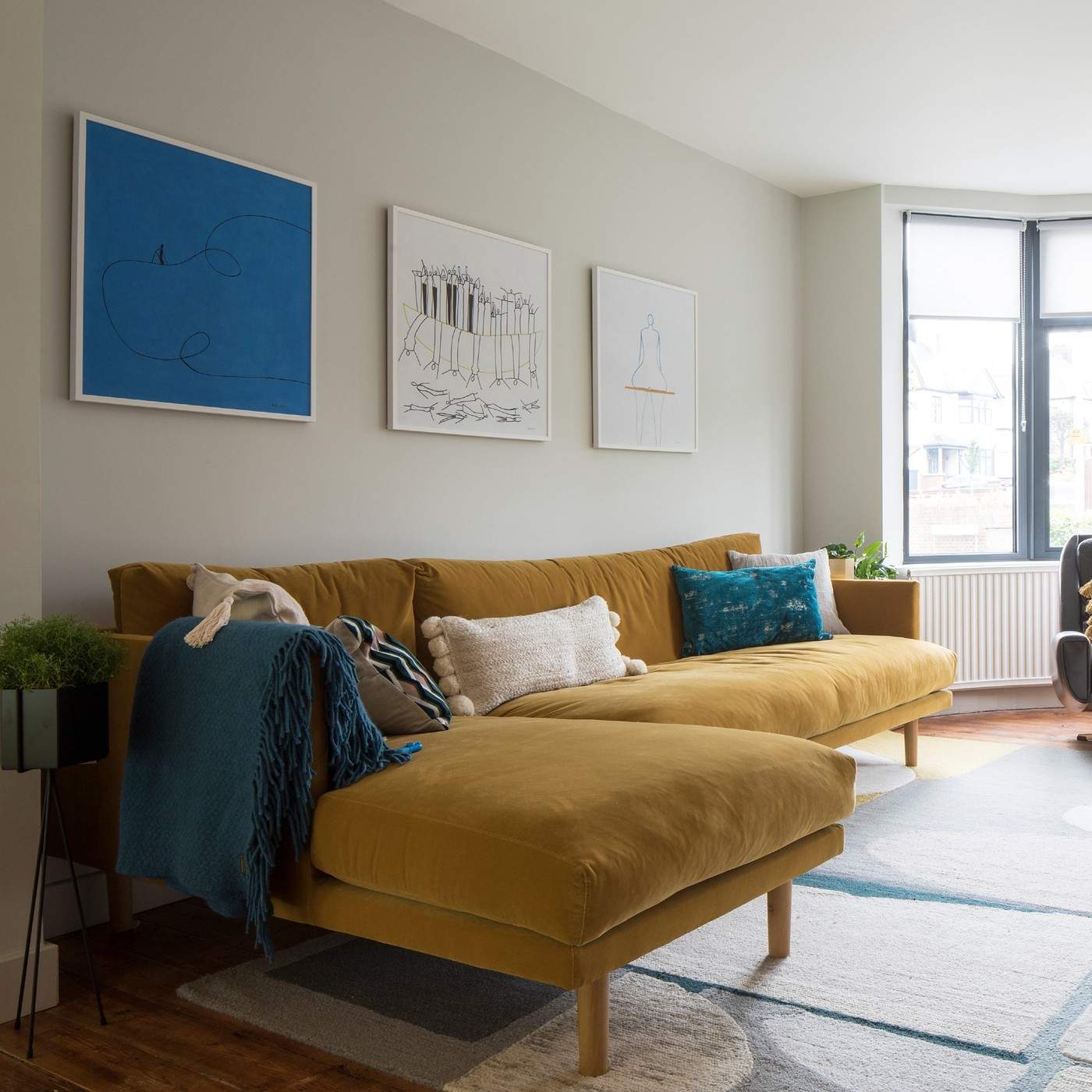 Place Sofa Front Legs on the Rug to Connect the Seating