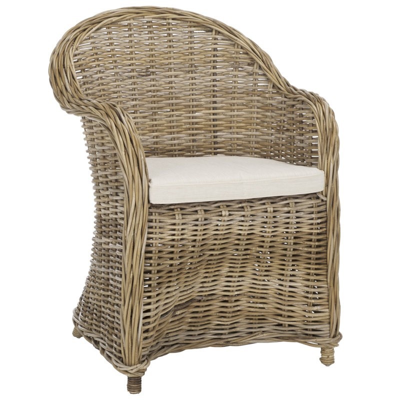 Rattan-framed armchair offered as a shopping alternative in the farmhouse living room article.