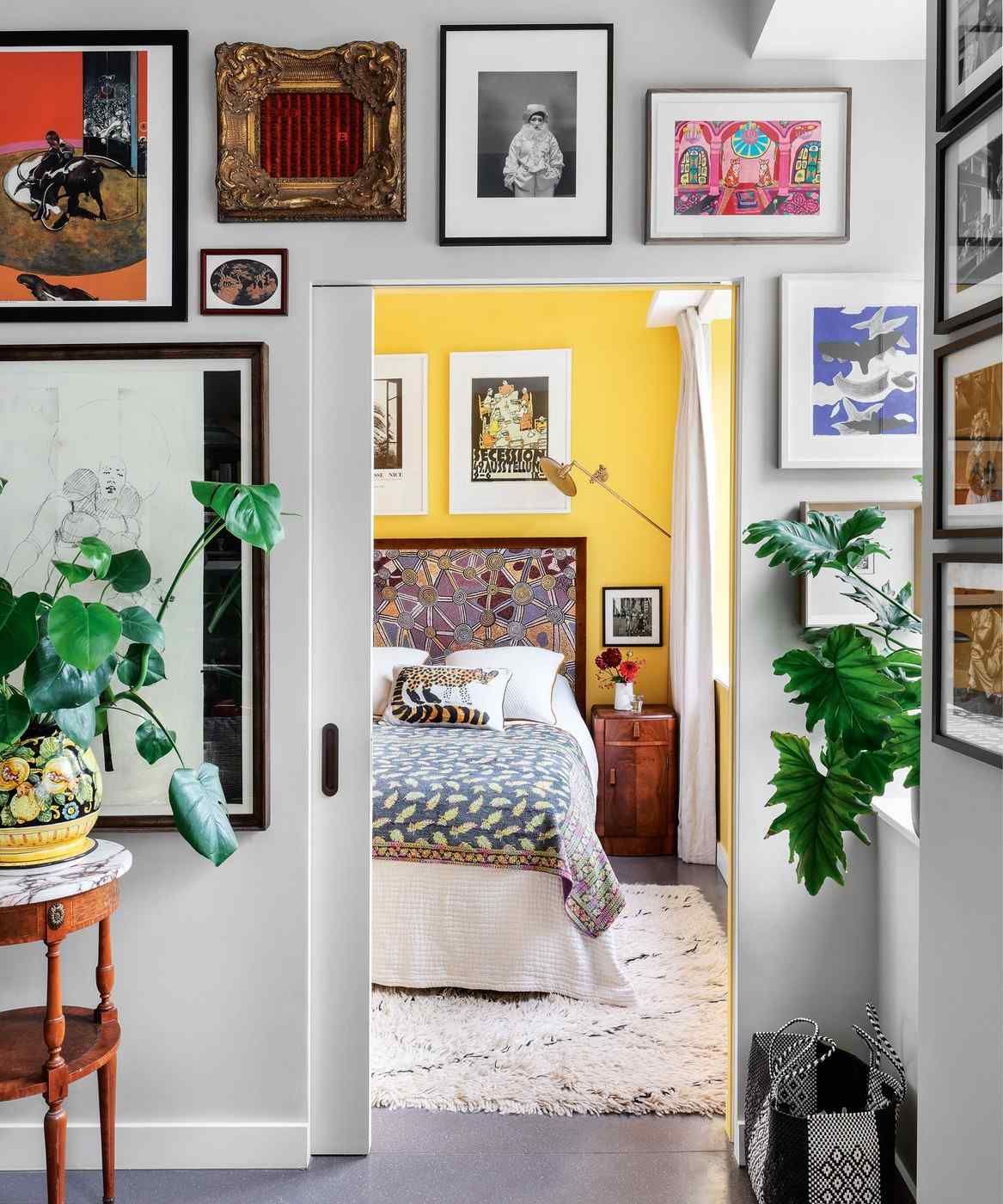 A Collected Gallery Wall for a Warm, Rustic Living Room