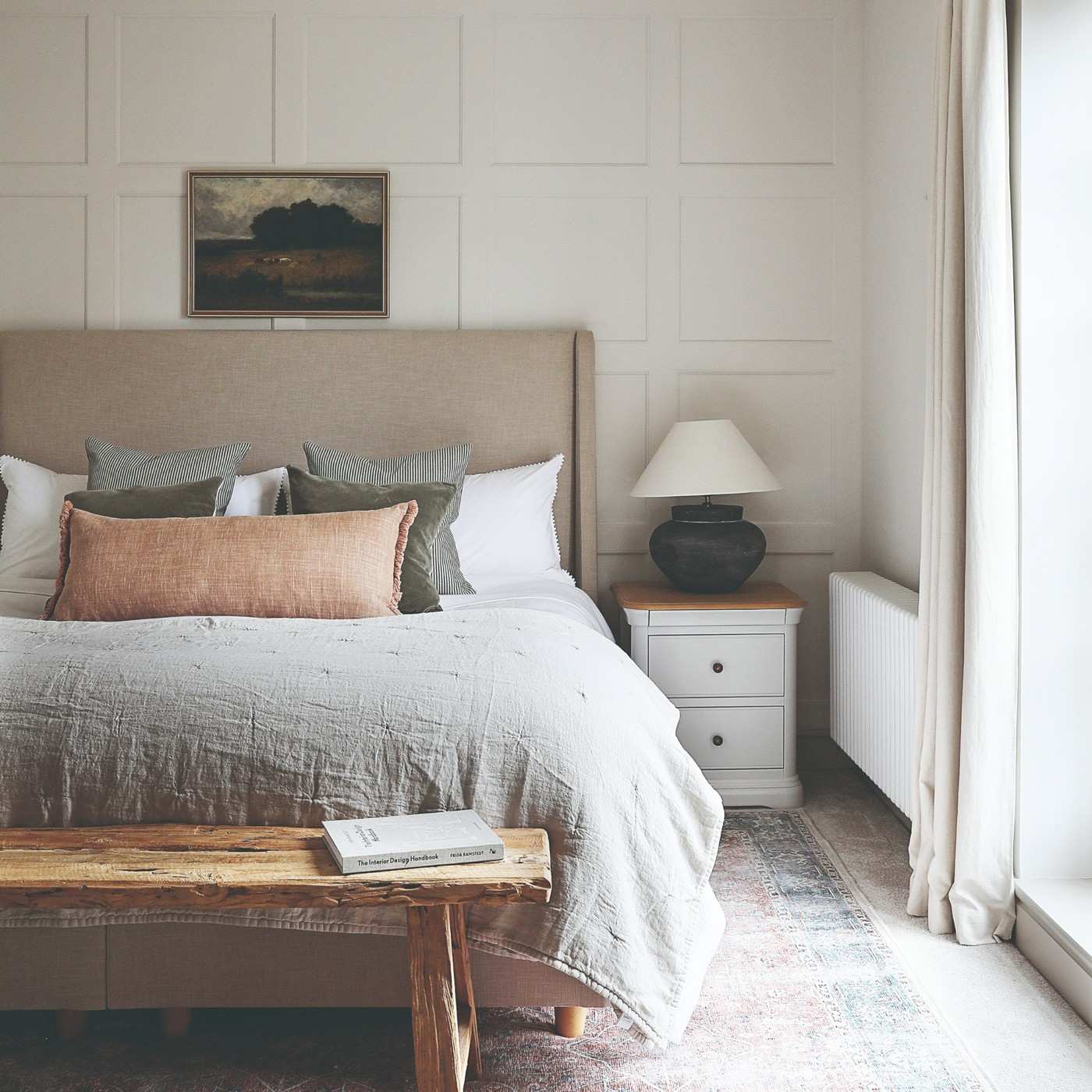 Use the Wall Behind the Bed to Organize a Small Room