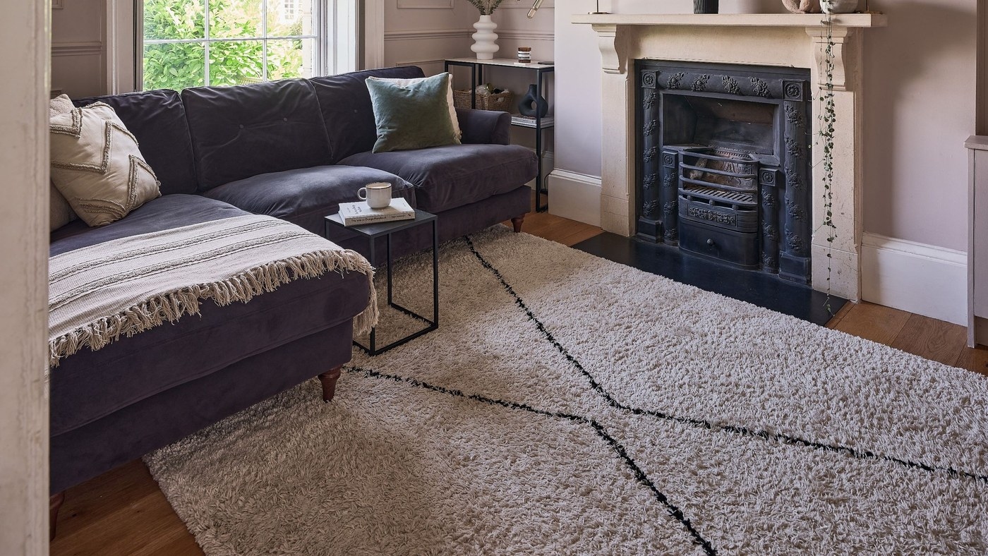 Place Sofa Front Legs on the Rug to Connect the Seating