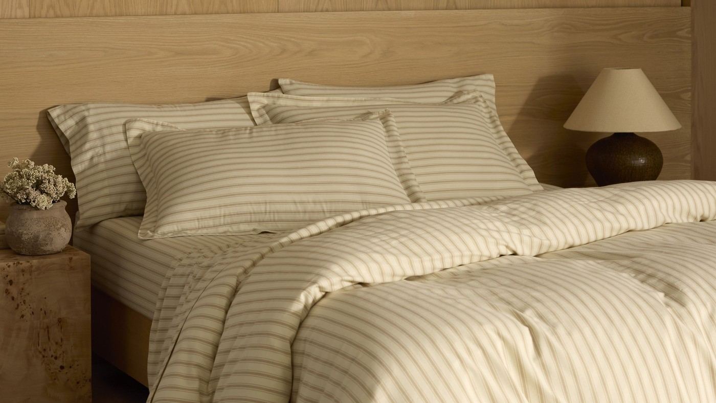 Layer Cotton Bedding with Navy, Neutrals, and Ticking Stripes