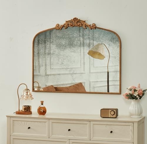 A Distressed Mirror Softens a Modern Farmhouse Entryway