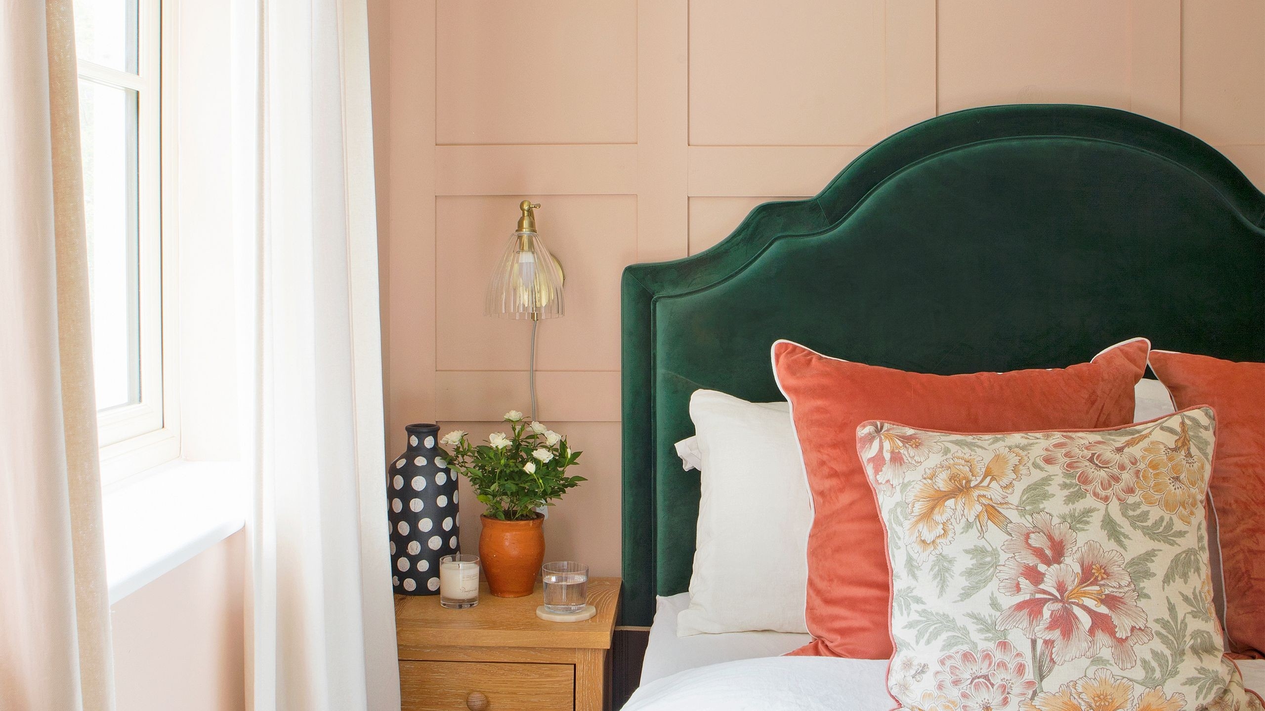 Use the Wall Behind the Bed to Organize a Small Room